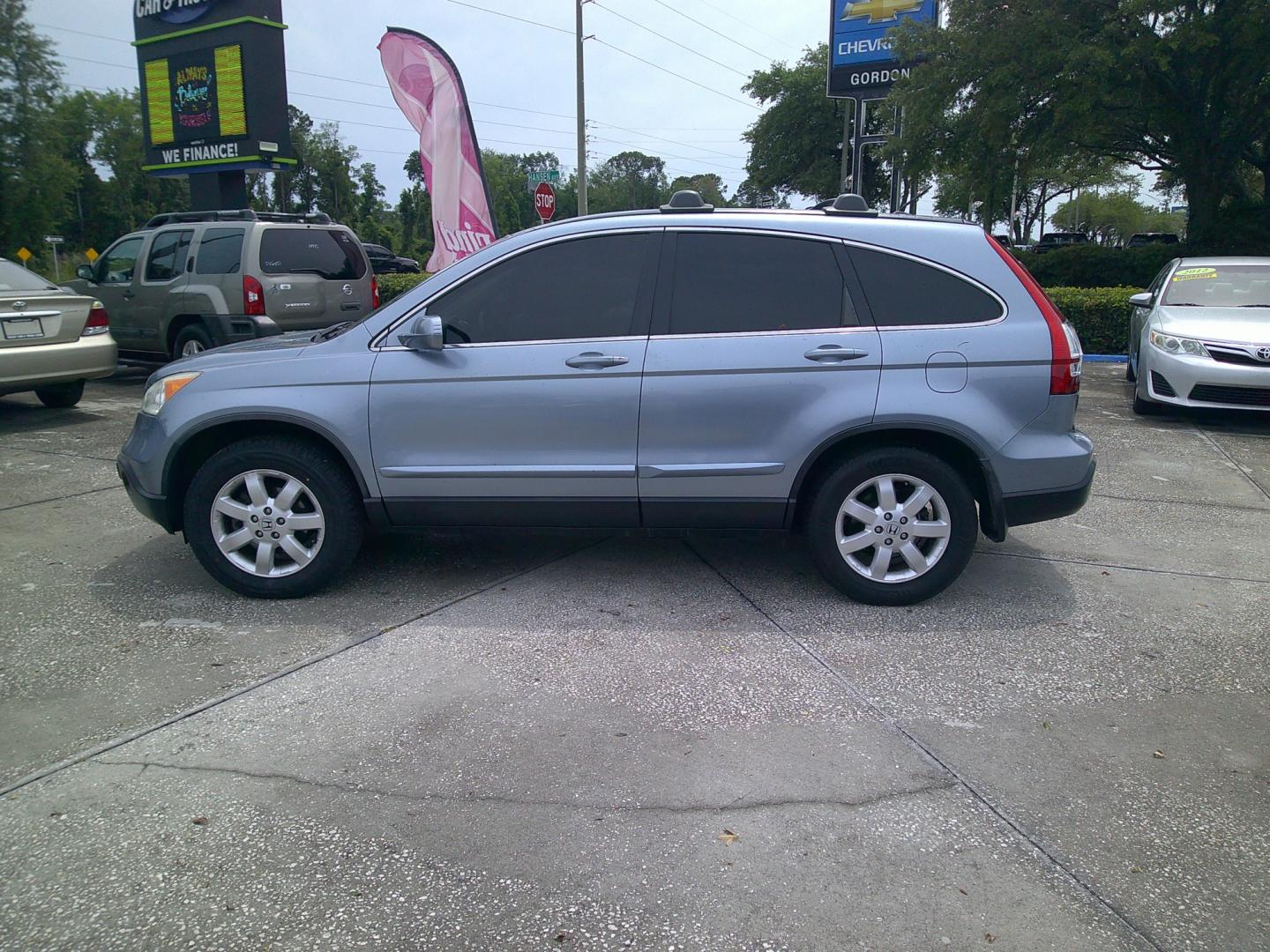 2009 BLUE HONDA CR-V EX-L (JHLRE48749C) , located at 10405 Abercorn Street, Savannah, GA, 31419, (912) 921-8965, 31.988262, -81.131760 - Photo#4